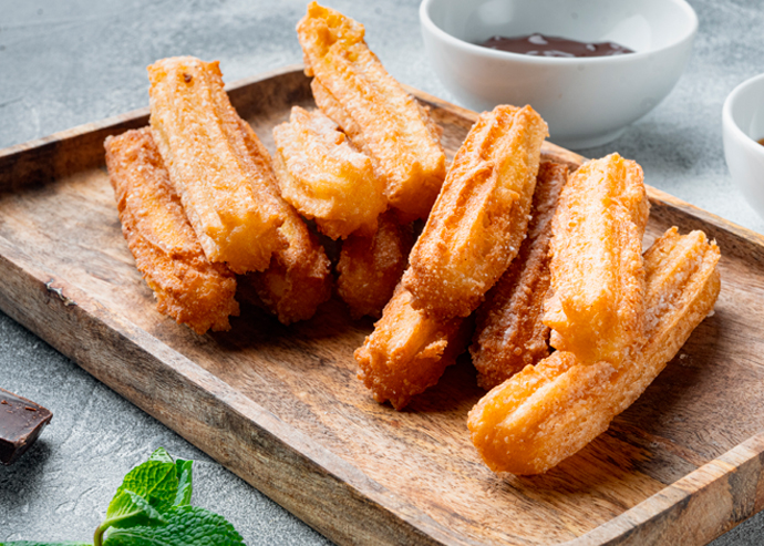 Churros con chocolate y miel