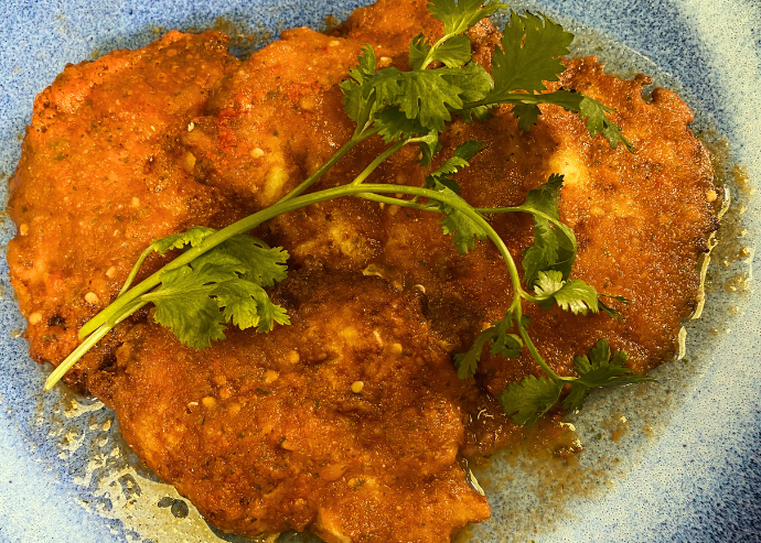 Tortitas de chayote en salsa de tomate Tortitas de chayote en salsa de tomate